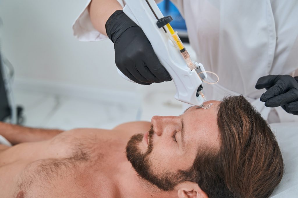 Beauty salon customer undergoing a mesotherapy procedure